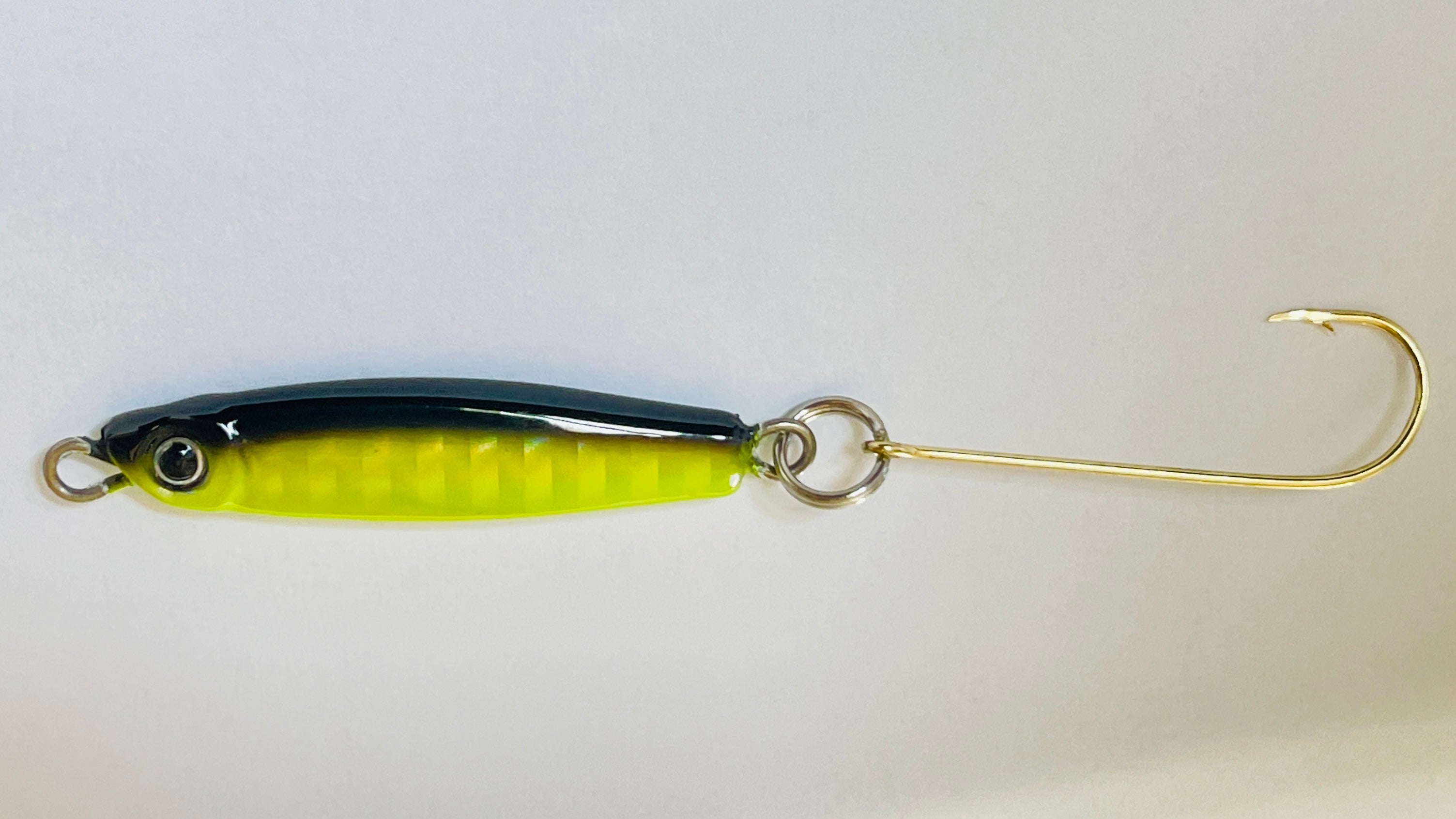 Jelifish USA Snagless Crappie Bomb™ - Fishing lure with a black top with a chartreuse belly.